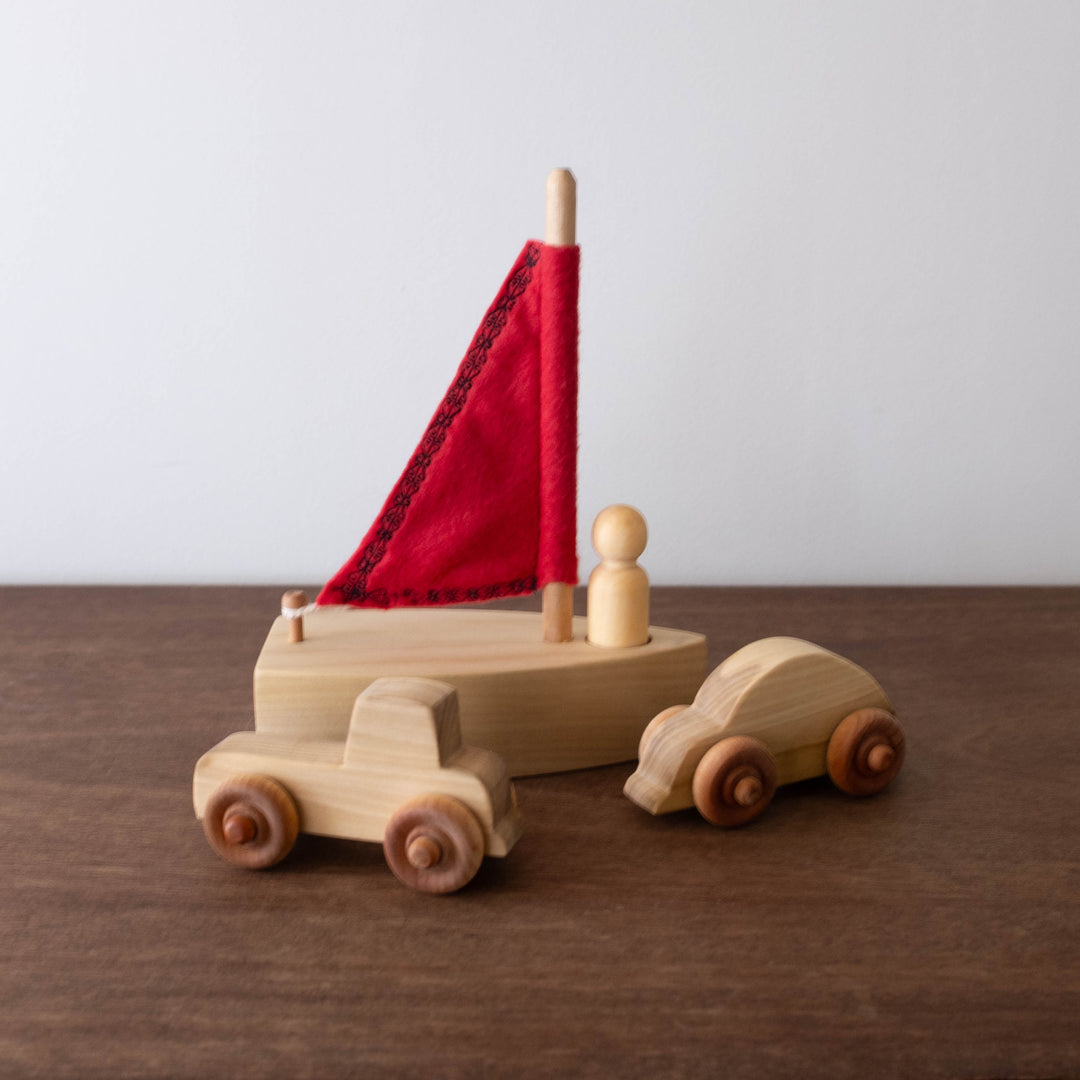 Wooden Sailboat with Peg Doll