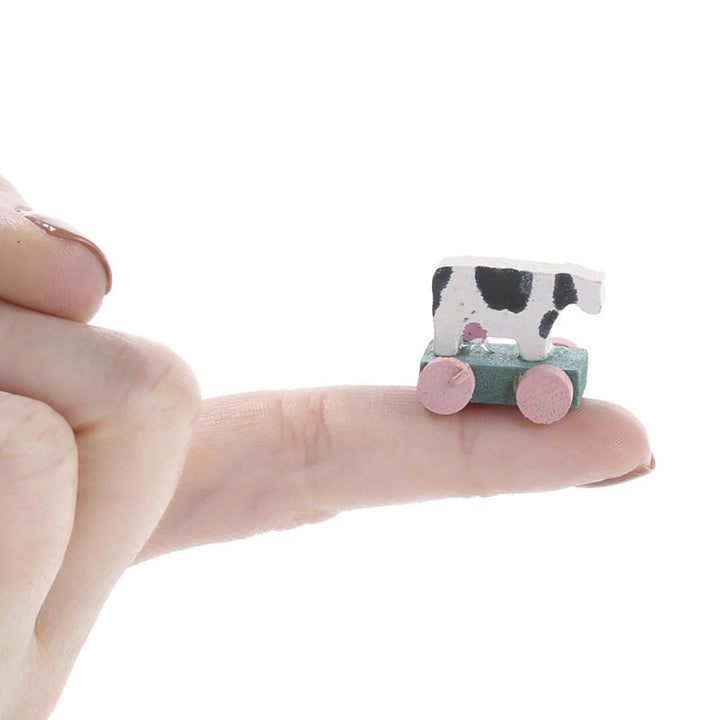 Dollhouse Miniatures: Antique Cow Pull Toy